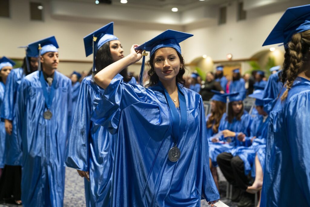 South Dade Academy graduate adjusting her cap